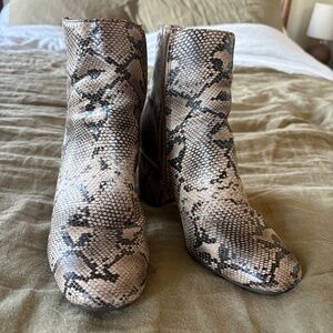 Women’s faux snake skin heel booties